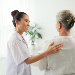 Nurse speaking with older patient about care and caregiver options | cCARE | Fresno & San Diego, CA